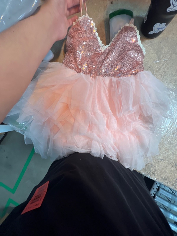 Photo 1 of A small pink puffy dress