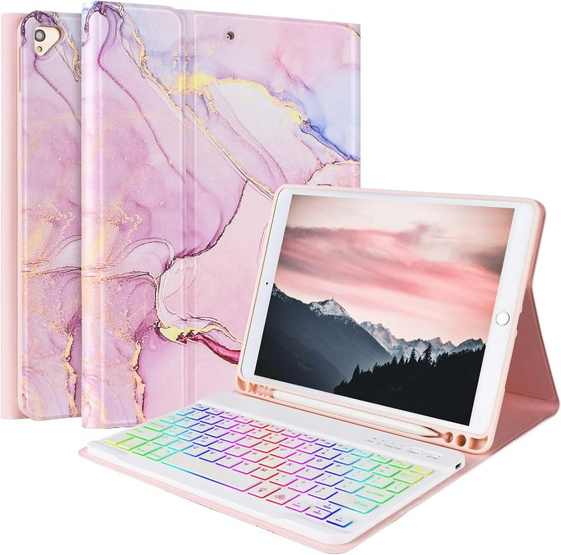 Photo 1 of FUWANG iPad 9th Generation Keyboard Case 10.2" 2021/(8th Gen) 2020/?7th Gen? 2019,7 Colors Backlit Keyboard Case for iPad 10.2" /iPad Air 3 10.5"(3rd Gen)/iPad Pro 10.5" with Pencil Holder Pink