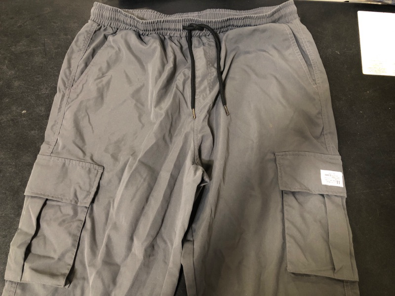 Photo 2 of 38 men's see photos different then stock cargo pants with black drawstring 