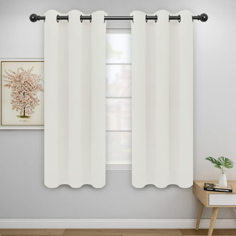Photo 1 of Easy-Going Blackout Curtains for Bedroom, Solid Thermal Insulated Grommet and Noise Reduction Window Drapes, Room Darkening Curtains for Living Room, 2 Panels(42x63 in, Ivory)