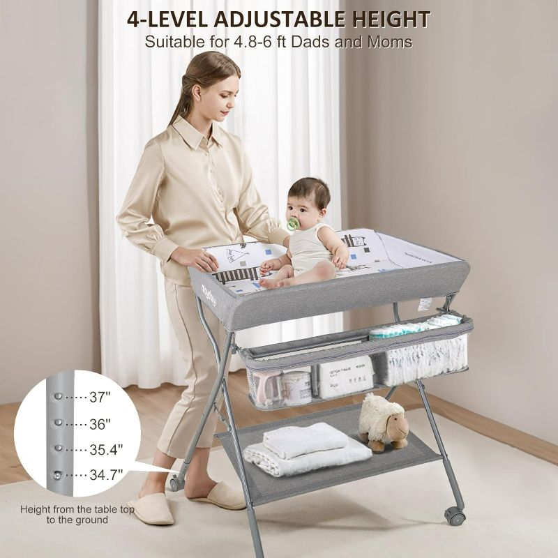 Photo 1 of Baby Changing Table with Wheels, Maydolly Portable Adjustable Height Folding Diaper Station with Nursery Organizer & Storage Rack for Newborn Baby and Infant (Light Grey)