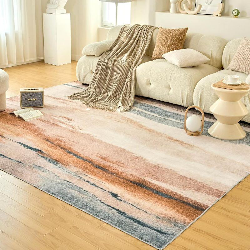 Photo 1 of OIGAE Machine Washable Rug 5x7 Area Rug Low-Pile Non-Shedding Foldable Abstract Modern Rugs, Stain Resistant Anti Slip Backing Rug for Bedroom&Dining Laundry Home Office Carpet, Living Room Orange
