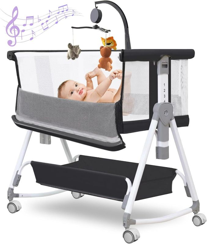 Photo 1 of Baby Bassinet,3 in 1 Baby Bassinets Bedside Sleeper with Musical Toy,Bedside Cribs with Storage Basket and Wheels,7 Height Adjustable Easy Folding Bassinet,Safe Co-Sleeping Crib(Black