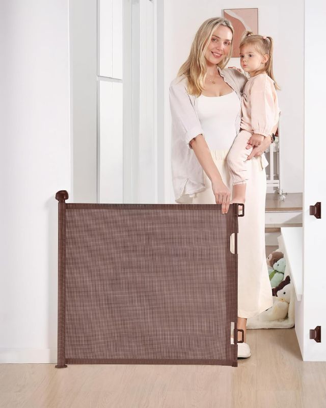 Photo 1 of Retractable Baby Gate, Mesh Baby and Pet Gate 33" Tall, Extends up to 55" Wide, Child Safety Baby Gates for Stairs Doorways Hallways, Dog Gate Cat Gate for Indoor and Outdoor (Brown)