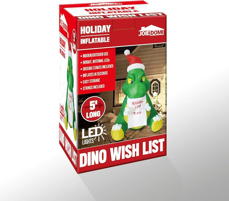 Photo 2 of Joiedomi 5 FT Dinosaur Christmas Inflatable Outdoor Decoration, Sitting Dinosaur Inflatable Build-in LEDs Blow Up Inflatables for Xmas Party Indoor, Outdoor, Yard, Garden, Lawn, Winter Décor
