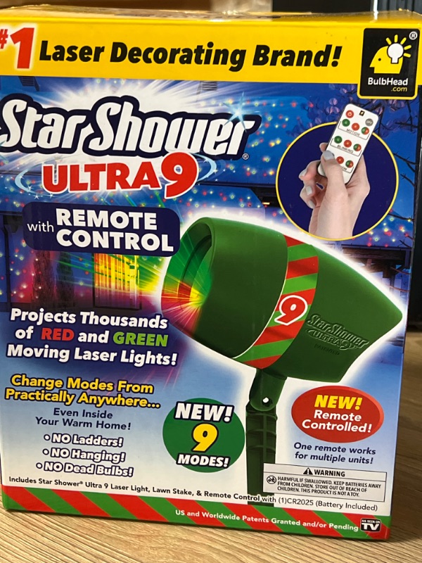 Photo 2 of Star Shower Ultra 9 Outdoor Laser Light Show with Remote, AS-SEEN-ON-TV, New 9 Unique Patterns, Showers Home w/Thousands of Lights, 3 Color Combinations, Motion or Still, Up to 3200 Sq Ft