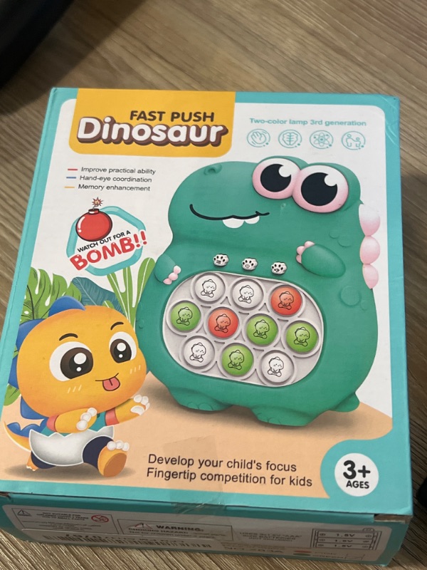 Photo 2 of Fast Push Game Dinosaurs Shape Handheld Game 4 Modes Games Fast Push Bubble Game
