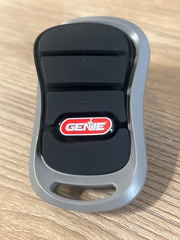 Photo 2 of Genie authentic G3T-R 3-button Intellicode garage door opener remote with, works only on Genie openers, single pack
