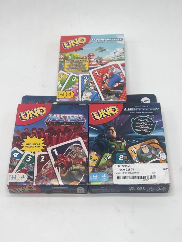 Photo 1 of 3 Pack Miscellaneous Uno Bundle Masters Of Universe, Mario Kart & Buzz Lightyear