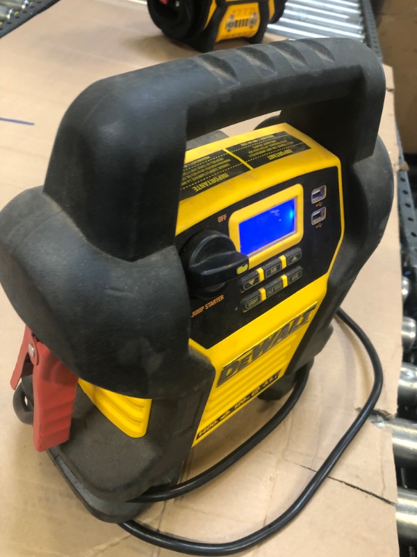 Photo 1 of DEWALT DXAEJ14 Digital Portable Power Station Jump Starter - 1400 Peak Amps with 120 PSI Compressor, AC Charging Cube, USB Port for Electronic Devices---THERE ARE RETURNS ON THIS ITEM -----SALE FOR PARTS -------UNSURE HOW FUNCTIONAL THIS ITEM IS 
