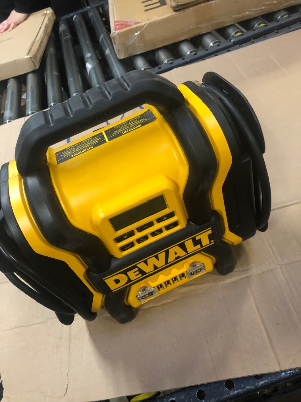 Photo 2 of DEWALT DXAEPS14 1600 Peak Battery Amp 12V Automotive Jump Starter/Power Station with 500 Watt AC Power Inverter, 120 PSI Digital Compressor, and USB Power , Yellow----THERE IS NO RETURNS ON THIS ITEM UNABLE TO TEST AND UINSURE HOW WELL IT WORKS 
