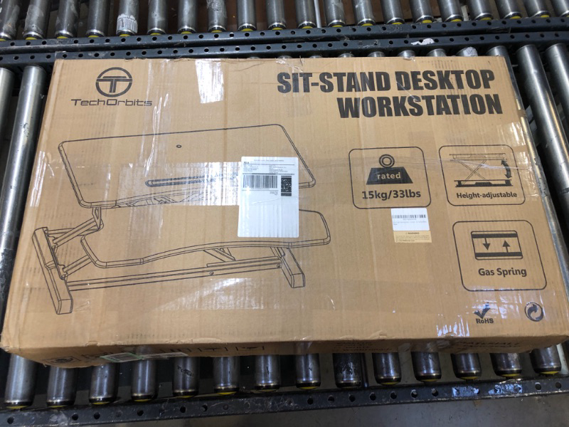 Photo 1 of Standing Desk Converter - 32" Height Adjustable Stand Up Desk Riser - Sit to Stand Desktop Workstation