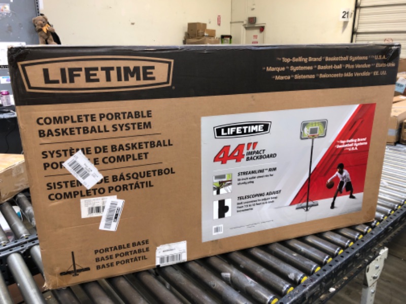Photo 4 of Lifetime 90992 Full-Size Height Adjustable Portable Basketball Hoop, 7.5 to 10 Foot Telescoping Adjustment, 44-Inch Impact Backboard