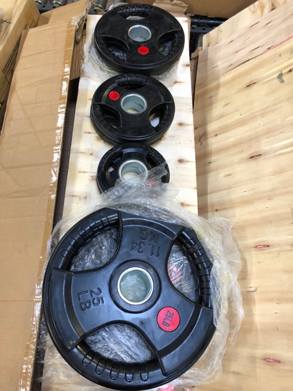 Photo 1 of Signature Fitness Cast Iron Olympic 2-Inch Weight Plates Including 7FT Olympic Barbell, 130-Pound, 300-Pound or 325-Pound Set, Multiple Packages 130LB Set with Barbell Style #4