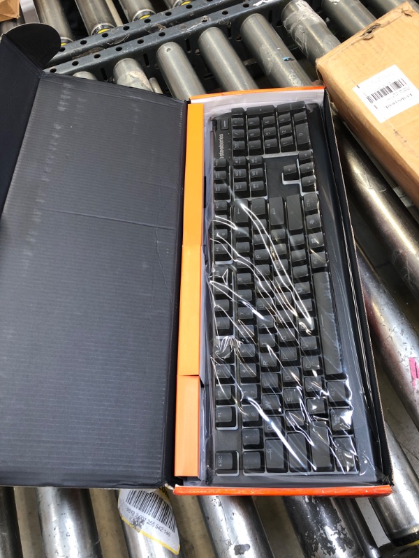 Photo 2 of SteelSeries Apex 3 RGB Gaming Keyboard – 10-Zone RGB Illumination – IP32 Water Resistant – Premium Magnetic Wrist Rest (Whisper Quiet Gaming Switch)