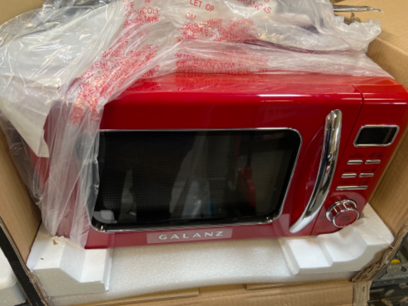 Photo 2 of Galanz GLCMKZ09RDR09 Retro Countertop Microwave Oven with Auto Cook & Reheat, Defrost, Quick Start Functions, Easy Clean with Glass Turntable, Pull Handle, 0.9 cu ft, Red Red .9 cu ft Modern