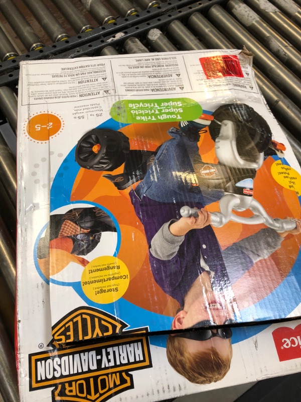 Photo 1 of Fisher-Price Harley-Davidson Tricycle with Handlebar Grips and Storage Area, Multi-Terrain Tires, Tough Trike [Amazon Exclusive]