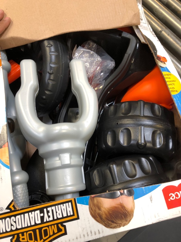 Photo 1 of Fisher-Price Harley-Davidson Tricycle with Handlebar Grips and Storage Area, Multi-Terrain Tires, Tough Trike [Amazon Exclusive]