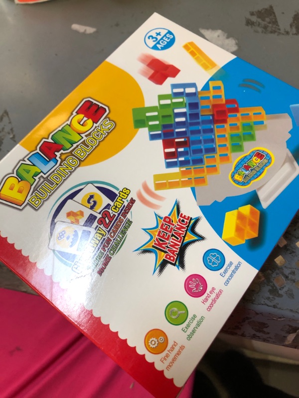 Photo 2 of  Tetra Tower Game, Stack Attack Block Puzzle Game, Board Team Tower Game for Kids ? Adults, Stacking Blocks Tetra Balance Game, Balance Stacking Toys Perfect for Family Games and Party 