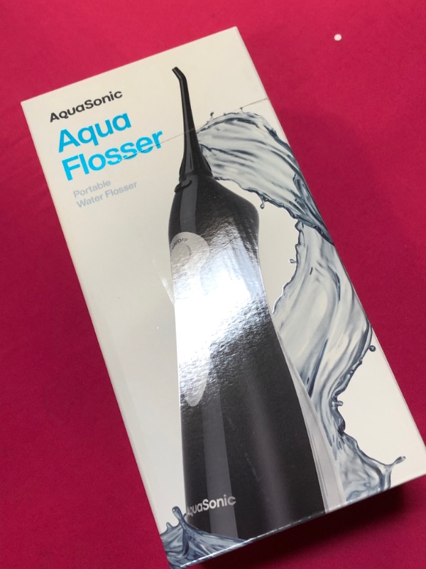 Photo 2 of Aquasonic Aqua Flosser - Professional Rechargeable Water Flosser with 4 Tips - Oral Irrigator w/ 3 Modes - Portable & Cordless Flosser - Kids and Braces - Dentist Recommended Black