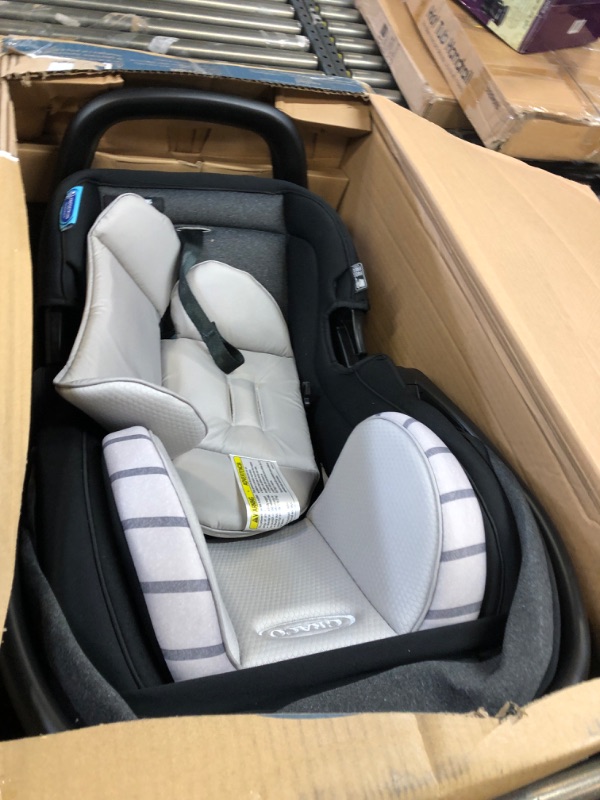 Photo 2 of Graco® SnugRide® SnugFit 35 DLX Infant Car Seat, Maison