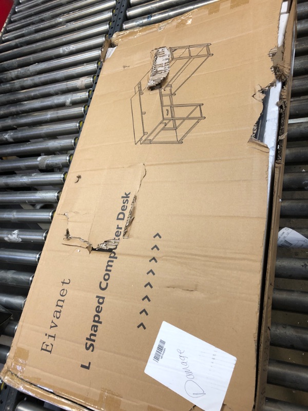 Photo 1 of Eivanet L Shaped Gaming Desk with Power Outlet & LED Light, Corner Gaming Desk with Hook & Monitor Stand, Reversible Computer Office Desk with Drawer and Storage Shelves for Home Office Black