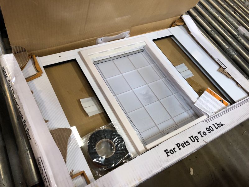 Photo 3 of Ideal Pet Products Aluminum Sash Window Pet Door, Adjustable 10-1/2” x 15” Flap Size Window Width: 33" - 38"