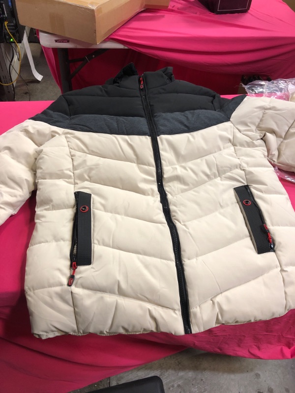 Photo 1 of mens/womens puffer jacket grey black and beige 
unknown size 
size appears to be medium/large 