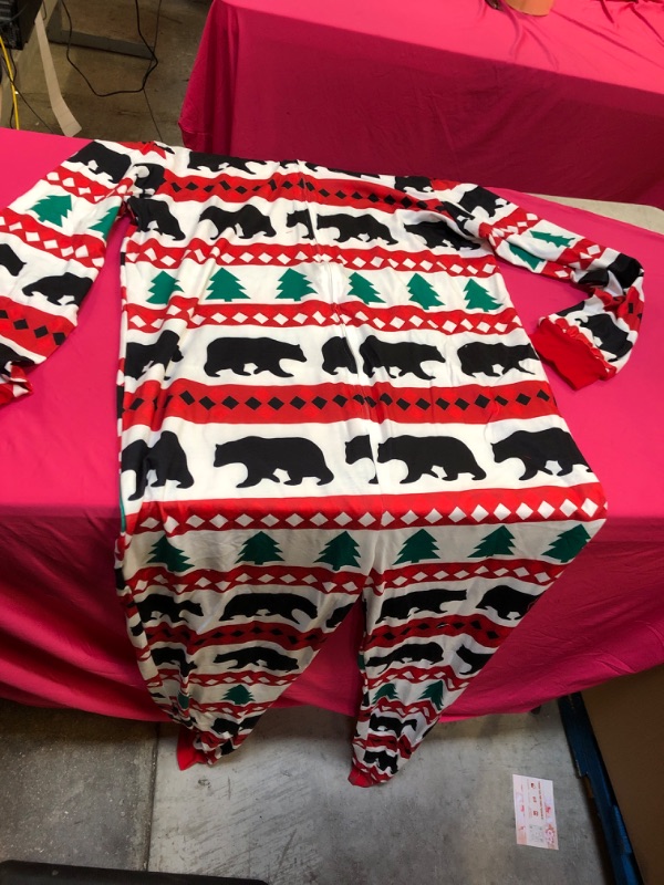 Photo 1 of ADULT CHRISTMAS ONESIE 
SIZE-LARGE 