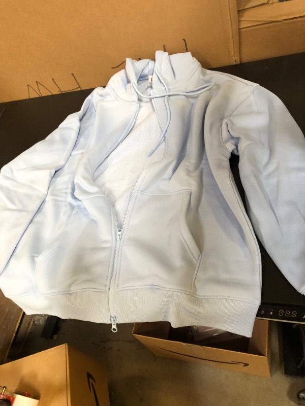 Photo 1 of large baby blue zip up jacket
 