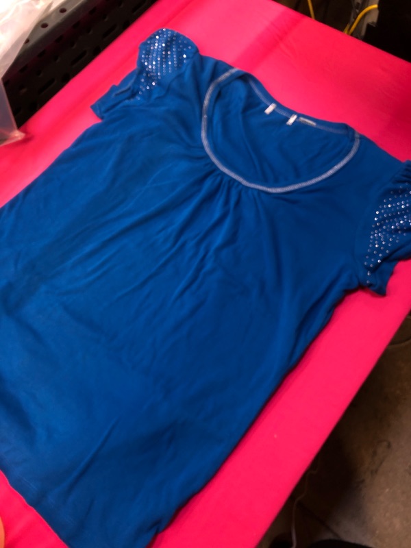 Photo 1 of L blue shirt with rhinestones on shoulders and neck line 