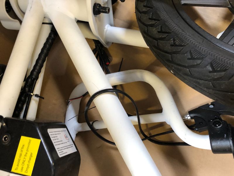 Photo 3 of FOR PARTS ONLY!!!!!  Droyd Blipper Electric Mini Bike - Electric Bike for Kids Ages 13 & Up - 250W Mini Bike w 12.5MPH up to 12.5 Miles - Electric Bike for Kids up to 60 Mins Run Time w 16in Tire, 24V 10Ah Battery White
MAJOR DAMAGE!!! WIRES DISCONNECTED.