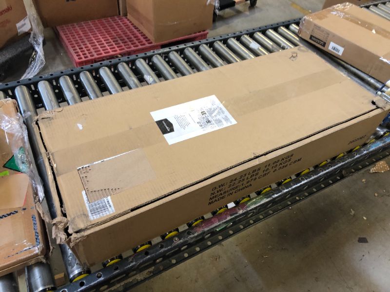 Photo 3 of Amazon Basics 4-Shelf Adjustable, Heavy Duty Storage Shelving Unit (350 lbs loading capacity per shelf), Steel Organizer Wire Rack, Black (36L x 14W x 54H) Black 4-Shelf Storage Unit without Caster