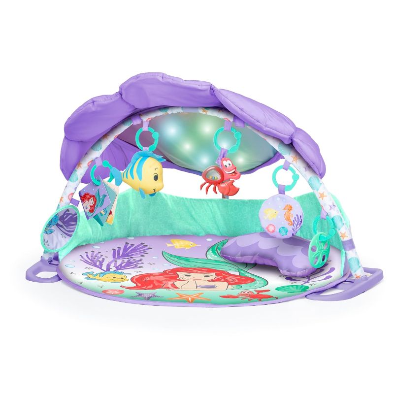 Photo 1 of Bright Starts Disney Baby The Little Mermaid Twinkle Trove Light-Up Musical Baby Activity Gym with Tummy Time Pillow, Newborn+
