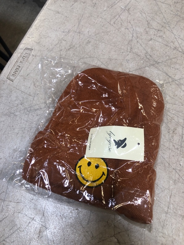 Photo 1 of BROWN SMILEY FACE BEANIE 