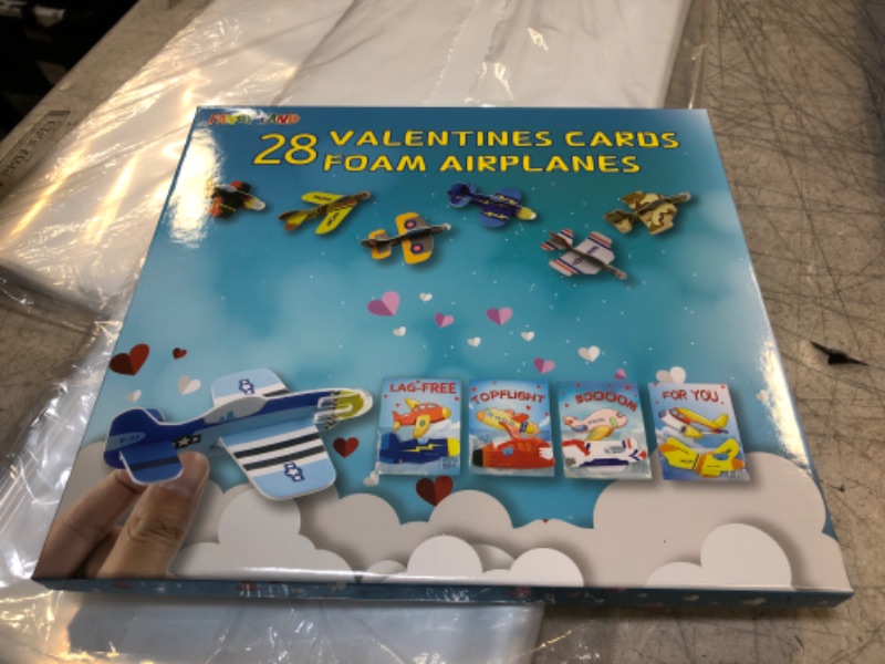 Photo 2 of FANCY LAND Valentine Gift Cards with Foam Airplanes for Kids Classroom Gift Exchange Valentines Party Favor Toys 28 Pack