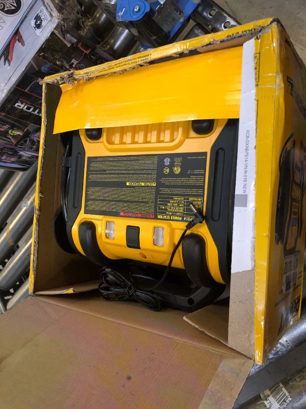 Photo 1 of DEWALT DXAEPS14 1600 Peak Battery Amp 12V Automotive Jump Starter/Power Station with 500 Watt AC Power Inverter, 120 PSI Digital Compressor, and USB Power , Yellow