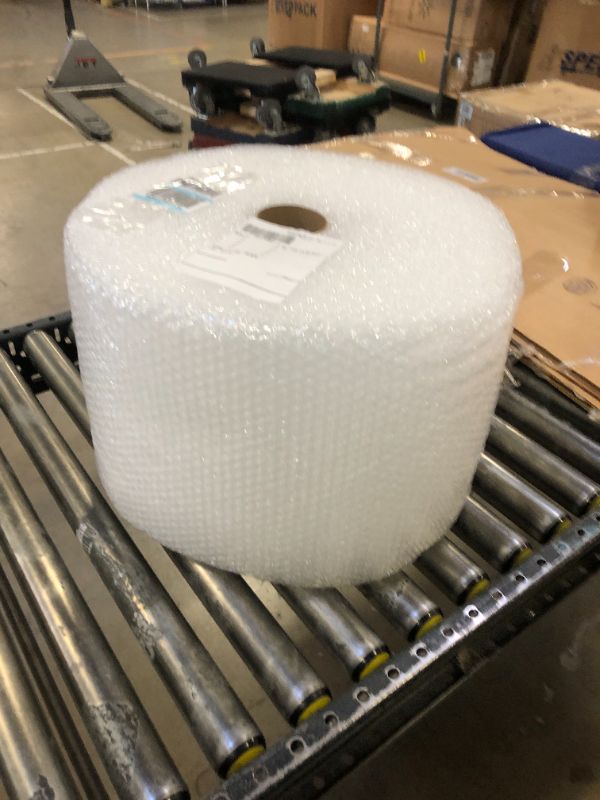 Photo 2 of Amazon Basics Perforated Bubble Cushioning Wrap, Small 3/16", 12-Inch x 175 Foot Long Roll, Clear
