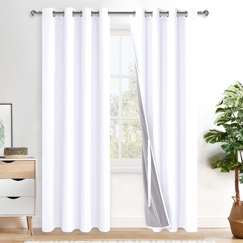 Photo 1 of XWZO 100% Blackout Curtains 2 Panels with Tiebacks- Heat and Full Light Blocking Window Treatment with Black Liner for Bedroom/Nursery, Grommet Top, White, W52 x L84 Inches Long, Set of 2

