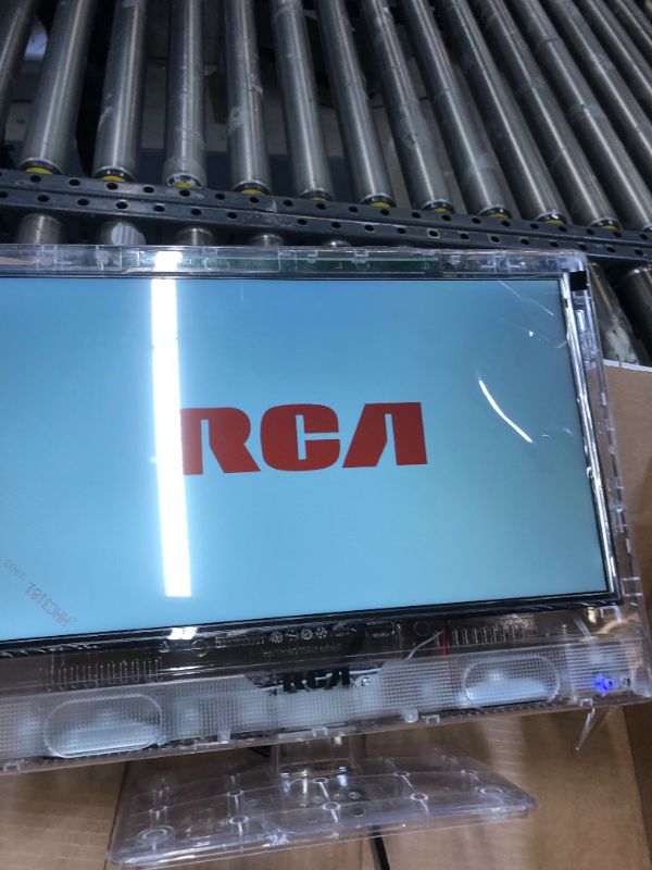 Photo 2 of RCA 15” Clearview HDTV | J15SE820 Transparent LED HD Television, High Resolution Wide Screen Monitor w/HDMI, VGA, Including Full Function Remote. 15"