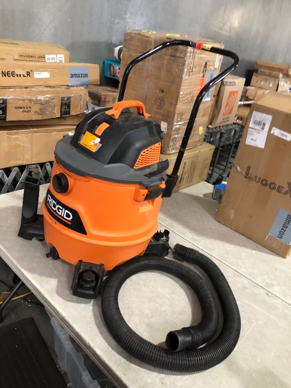 Photo 1 of ***NONREFUNDABLE - NOT FUNCTIONAL - FOR PARTS ONLY - SEE COMMENTS***
RIDGID 16 Gallon 6.5 Peak HP NXT Shop Vac Wet Dry Vacuum with Cart, Fine Dust Filter, Locking Hose and Accessories