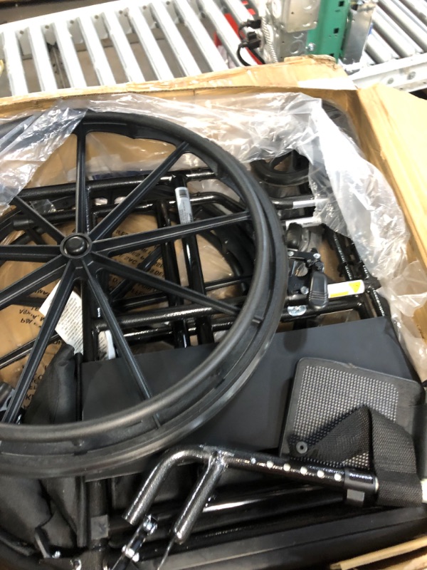 Photo 2 of ***USED - LIKELY MISSING PARTS - UNABLE TO VERIFY FUNCTIONALITY***
Drive Medical SSP118FA-SF Silver Sport 1 Folding Transport Wheelchair with Full Arms and Removable Swing-Away Footrest, Black