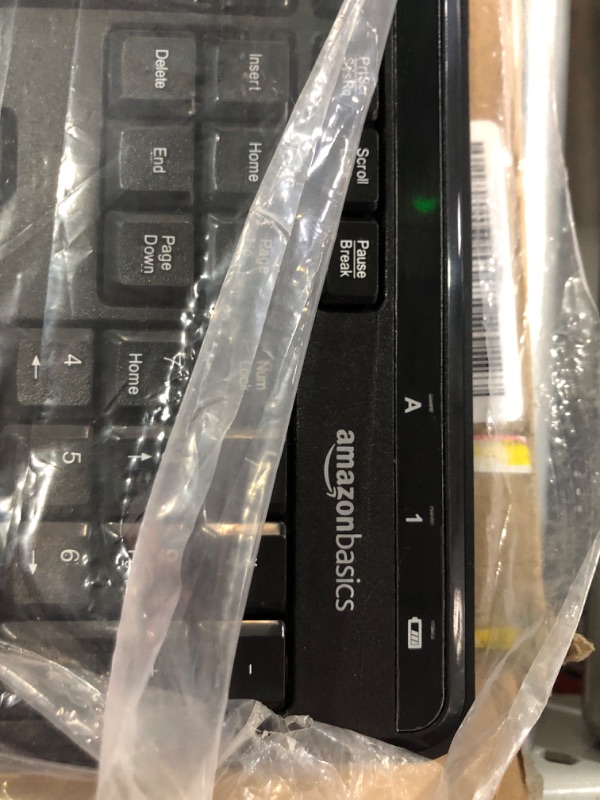 Photo 2 of Amazon Basics Wireless Computer Keyboard and Mouse Combo - Quiet and Compact - US Layout (QWERTY)