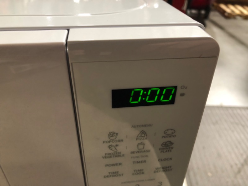 Photo 4 of ***USED - POWERS ON - UNABLE TO TEST FURTHER***
Nostalgia Modern Retro Countertop Microwave Oven - 900-Watt - 0.9 cu ft - 12 Pre-Programmed Cooking Settings - Digital Clock - Kitchen Appliances - White Modern Retro 0.9 Cu. Ft. White