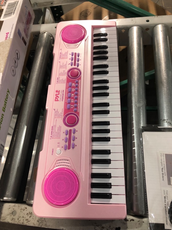 Photo 1 of PYLE-PRO Electric Keyboard Piano for Kids-Portable 49 Key Electronic Musical Karaoke Keyboard, Learning Keyboard for Children w/Drum Pad, Recording