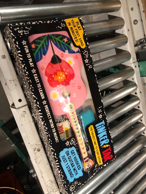 Photo 2 of TinkerTar - Pink Floral Acoustic Guitar - The Easiest Way to Start and Learn Guitar - 1 Stringed Toy Instrument for Kids Perfect Intro to Music for Young Kids Ages 3 and up - from Buffalo Games