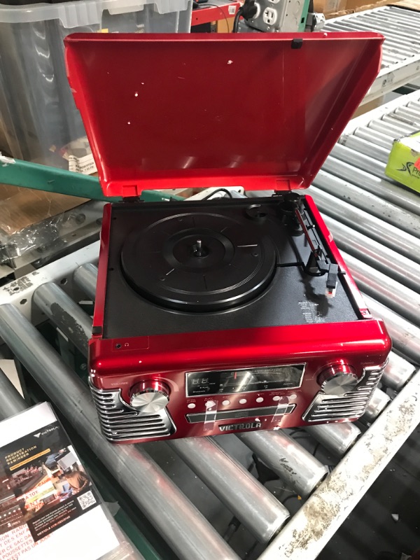 Photo 4 of ***USED - NO PACKAGING - POWERS ON - UNABLE TO TEST FURTHER***
Victrola 50's Retro Bluetooth Record Player & Multimedia Center with Built-in Speakers - 3-Speed Turntable, CD Player, AM/FM Radio | Wireless Music Streaming | Red