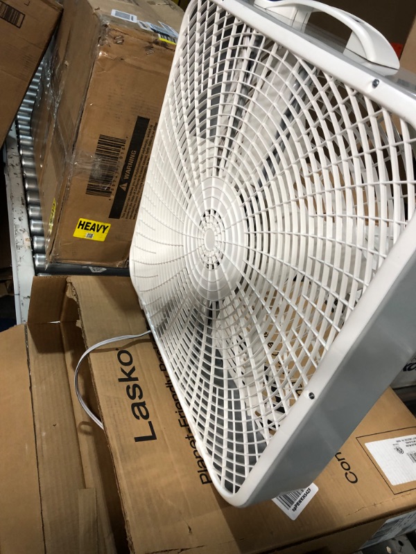 Photo 2 of **POWERS ON 
Lasko 20? Weather-Shield Performance Box Fan-Features Innovative Wind Ring System for Up to 30% More Air, 20 Inch, 3720