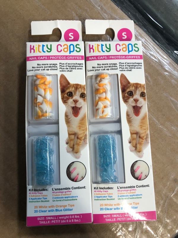 Photo 2 of *NON REFUNDABLE BUNDLE*
Kitty Caps Nail Caps for Cats | Safe, Stylish & Humane Alternative to Declawing | Stops Snags and Scratches, Small (6-8 lbs), White with Orange & Clear with Blue Glitter Small (6-8 lbs) (2Pack bundle)