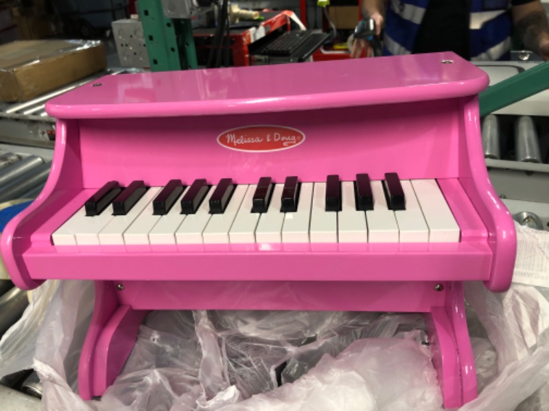 Photo 2 of ***NONREFUNDABLE - MAJOR DAMAGE - NOT FUNCTIONAL - FOR PARTS ONLY - SEE COMMENTS***
Melissa & Doug Learn-to-Play Pink Piano With 25 Keys and Color-Coded Songbook